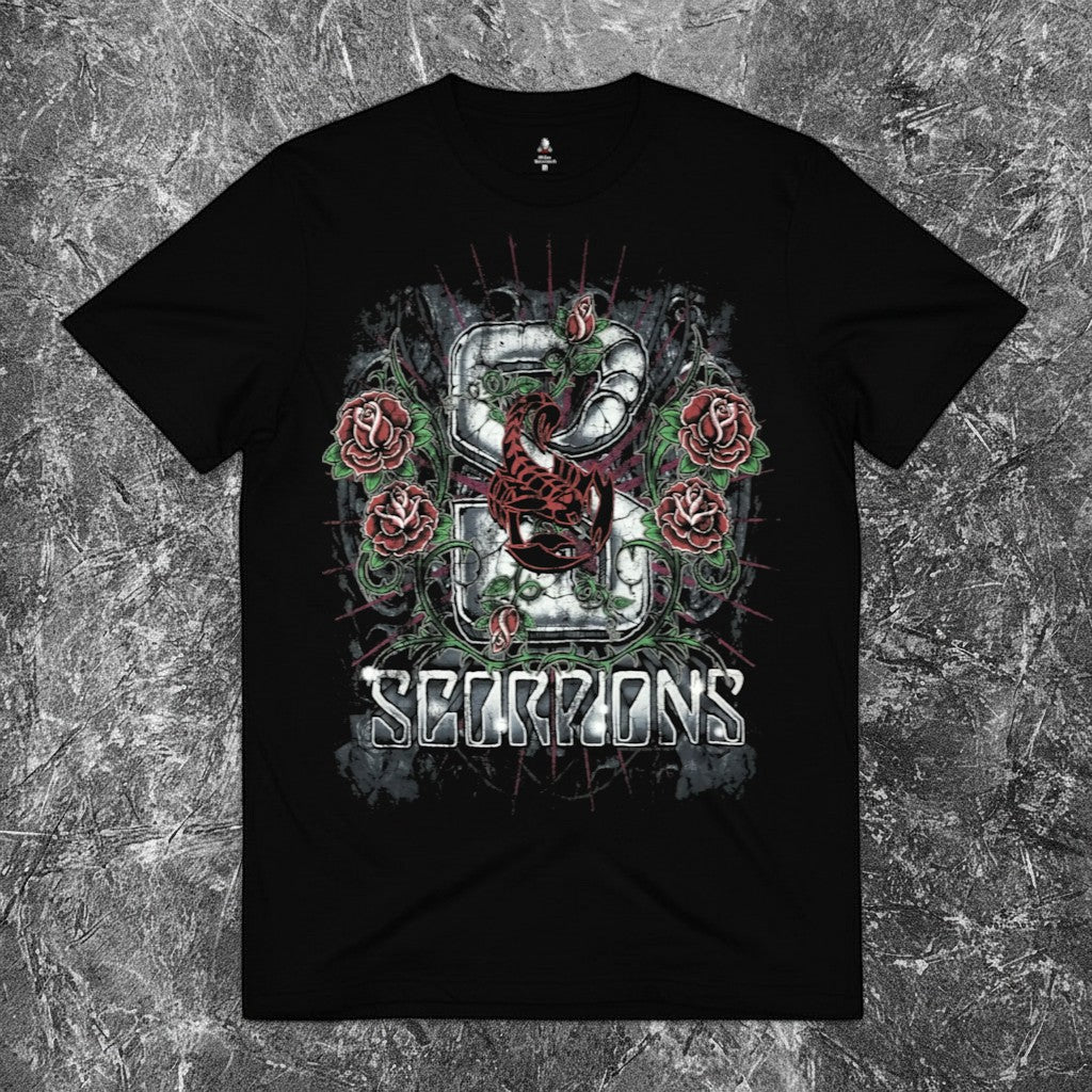 We Rock heavyweight black 100% cotton t-shirt with a relaxed fit, displayed against a textured grey background.