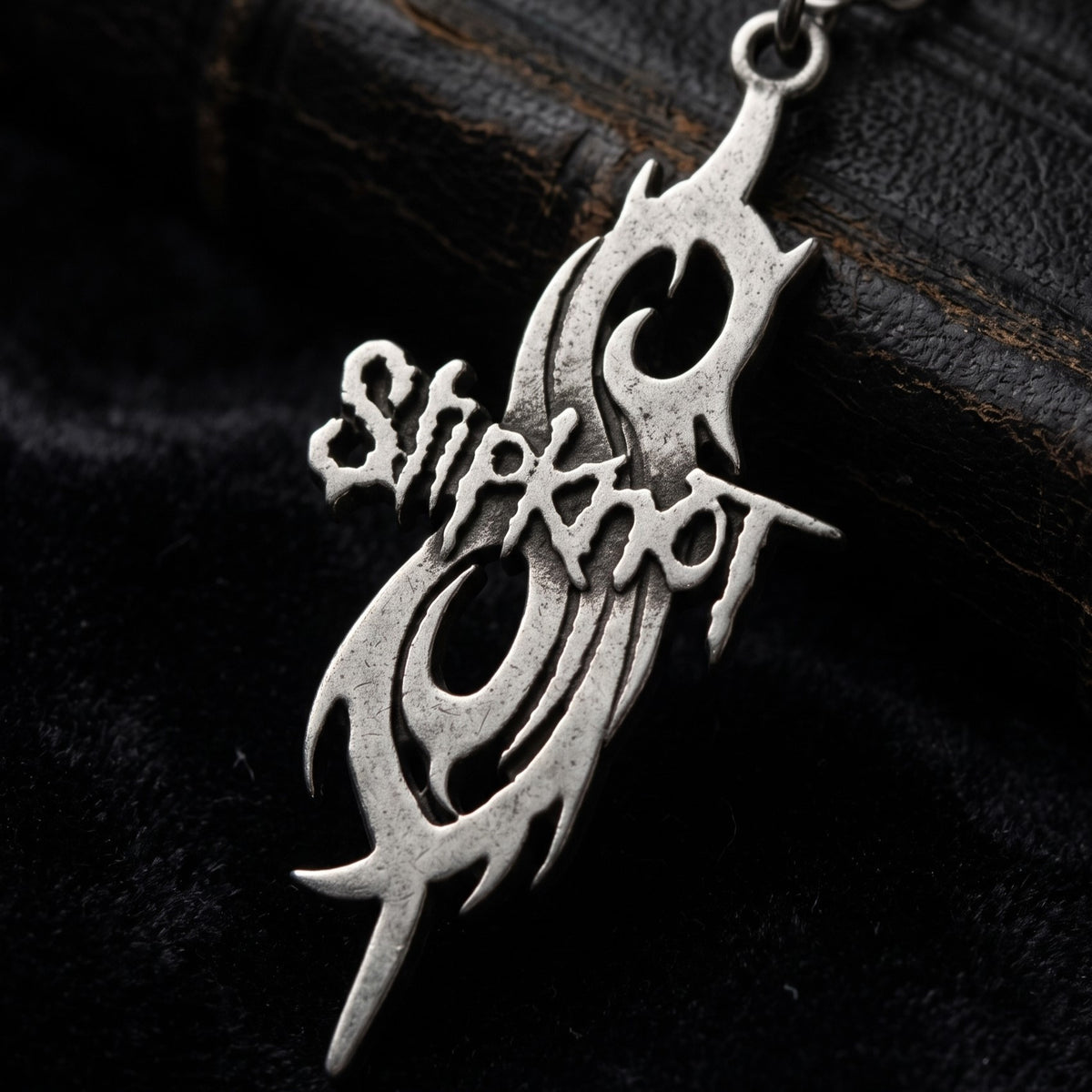 We Rock Slipknot logo 2 necklace in antique silver finish featuring the band's iconic tribal S logo design