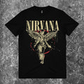 We Rock vintage-washed black heavyweight cotton t-shirt with a relaxed fit on a textured grey background